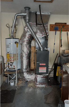 Water heater and furnace in utility room.